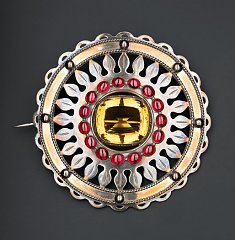 Click image for larger version. 

Name:	silver-plaid-brooch-set-with-a-cairngorm-in-the-centre-and-a-ring-of-sixteen-carbuncles-round-it.jpg 
Views:	15 
Size:	190.3 KB 
ID:	37016